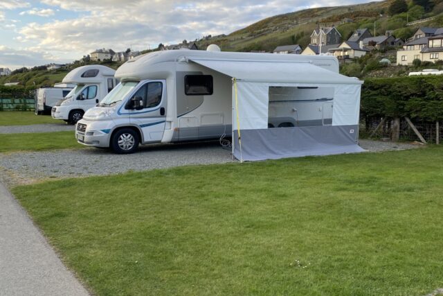 Motorhome and awning on hardstanding pitch
