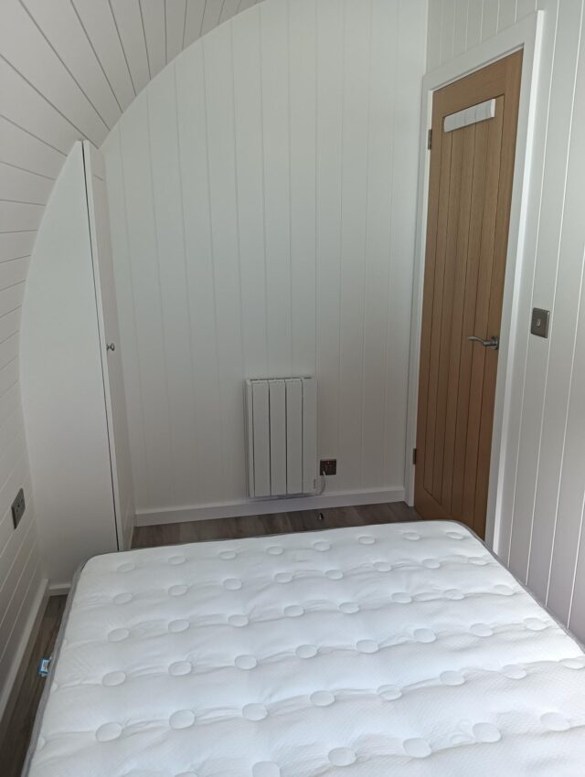 Deluxe pod bedroom wardrobe view